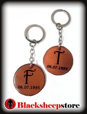 Coppia di portachiavi in cuoio